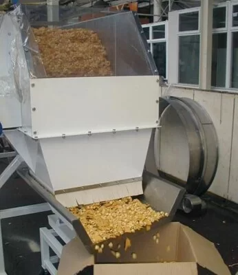 Bucket elevator with hopper and screen feeder loading.