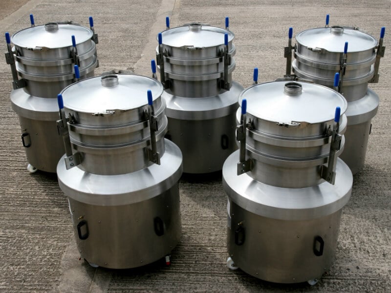 Five stainless steel vibrating separator.