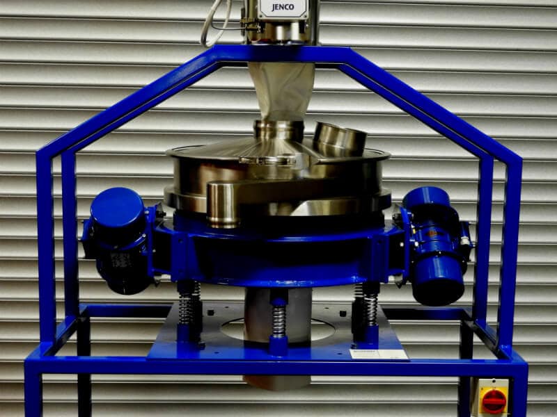 Vibrating screen on support frame.