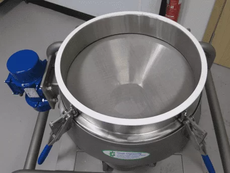 Vibrating batch sieve.